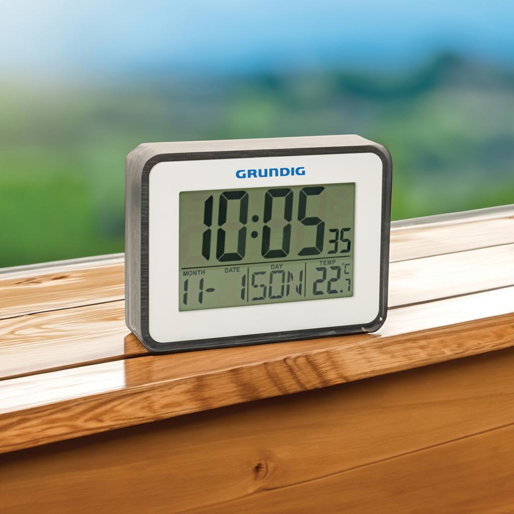 Stație meteorologică cu alarmă și calendar Grundig  transparent
