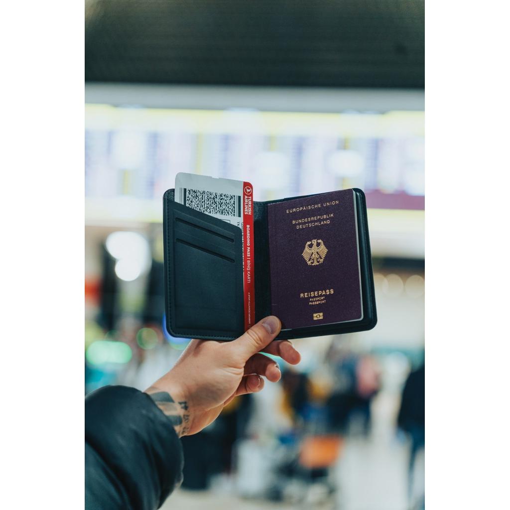 Trackmate RCS rpolyester passport holder worldwide locating black
