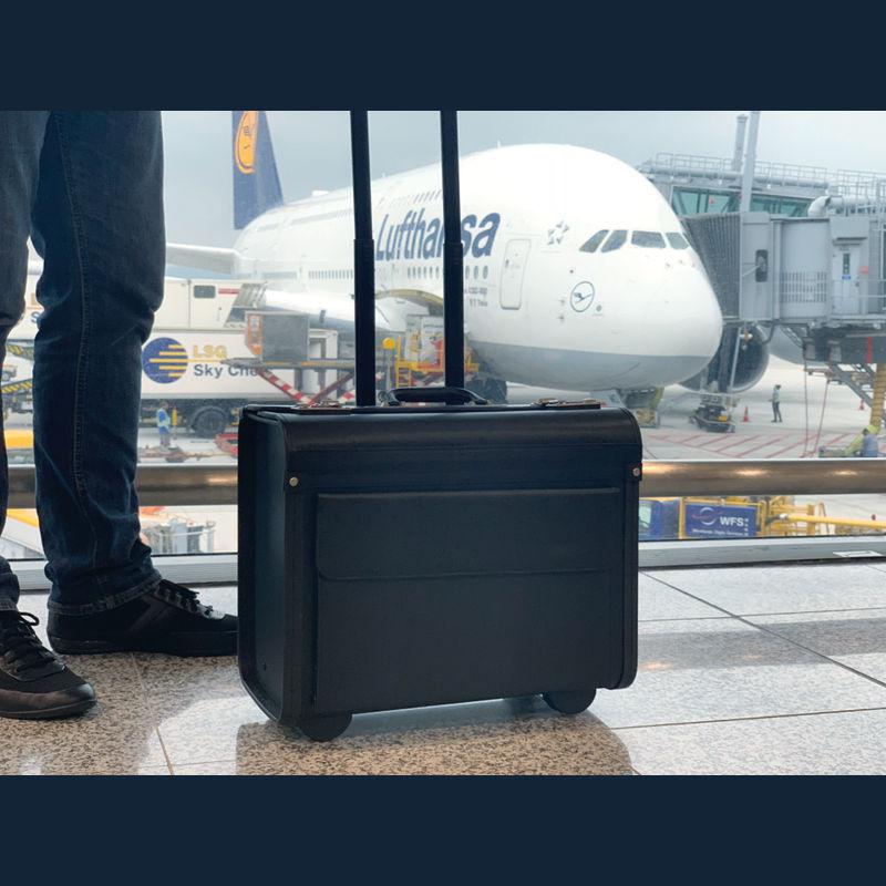 Servietă cu roţi Negru